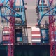 Drone Flying Over a Container Ship During Cargo Operations Over the Customs Area - VideoHive Item for Sale
