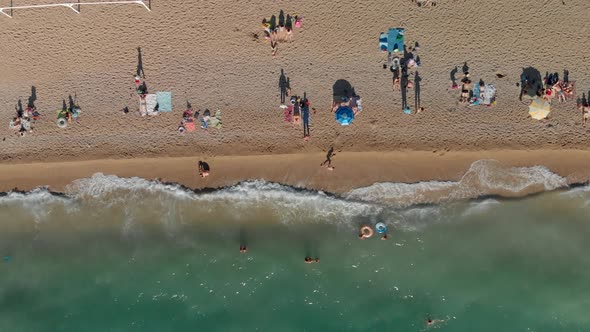 Aerial View on People in Sea Ocean