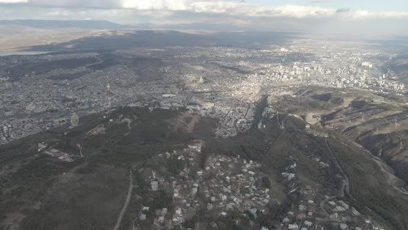 Aerial view of Okrokana district  with beautiful background of Tbilisi. Georgia