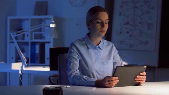 Businesswoman Having Video Call at Night Office