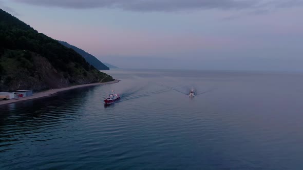 Aerial Footage of Excursion Boats on the Water Lake