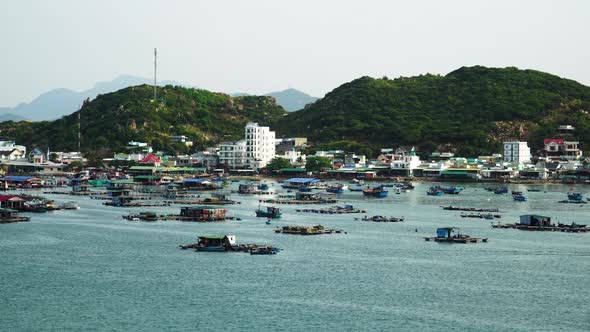 Static view of a bay in Binh Hung island. In the foreground: sea barracks and boats. Vietnam