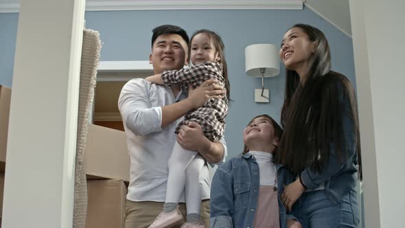 Happy Family Excited after Moving House