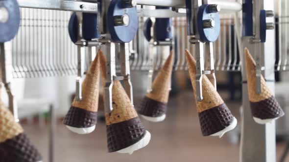 Ice Cream Production, Transportation Waffle-cone with Plombir Ice Cream on Production Line, Dairy