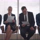 Diverse Applicants Waiting for Job Interview Sitting in Line and Reading Cv - VideoHive Item for Sale