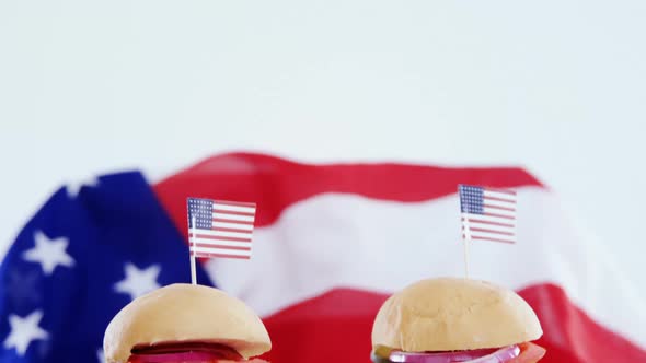 Hamburgers on wooden board with 4th july theme