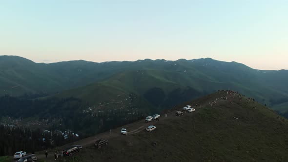 Tourist And Cars On Hilltop Above Bakhmaro