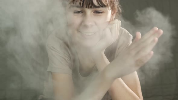 Girl using steam humidifier. 