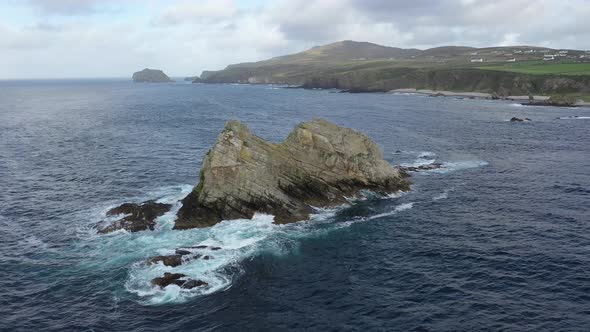 Flying Above Sea Stacks at the Beautiful Coast at Maling Well, Inishowen - County Donegal, Ireland