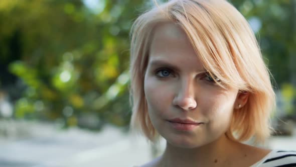 Beauty Portrait of a Young Woman with Blue Eyes. 