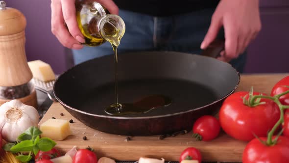 Making Pasta Carbonara  Pouring Olive Oil Into Frying Pan
