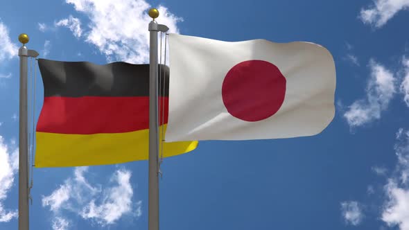 Germany Flag Vs Japan On Flagpole