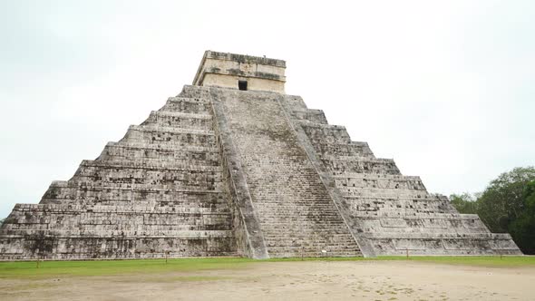 Ancient Chichen Itza pyramid ruins in Yucatan, Mexico on cloudy day. 7 wonders of the world.