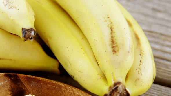 Bananas in wooden bowl