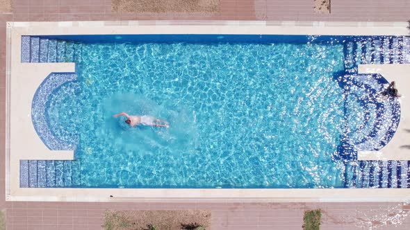 Man in a Swimming Pool