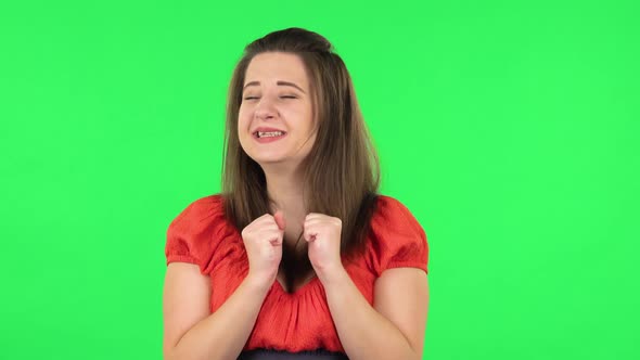 Portrait of Cute Girl Very Rejoicing, Clapping and Dancing. Green Screen