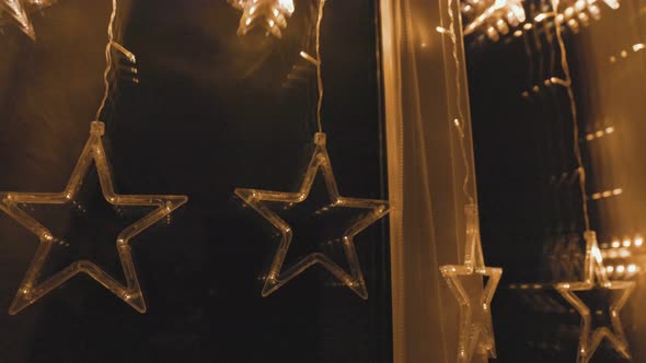 Garland in the Form of Stars on the Window