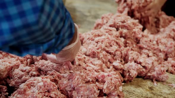 Close Up Shot of The Hands of Chefs Mix a Lot of Minced Meat