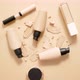 Bottles of Makeup Foundation and Samples on Beige Background - VideoHive Item for Sale