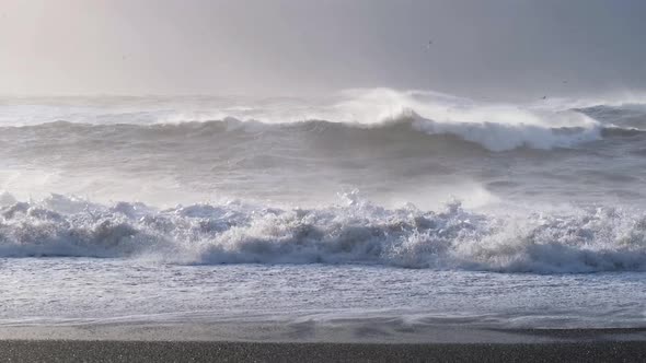 Huge waves during the storm. The ocean during a storm in the daytime.