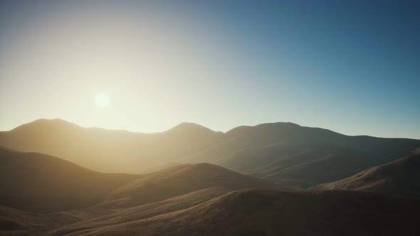 Hills with Rocks at Sunset alt