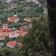 top view small village in italy between greenery and hills - VideoHive Item for Sale
