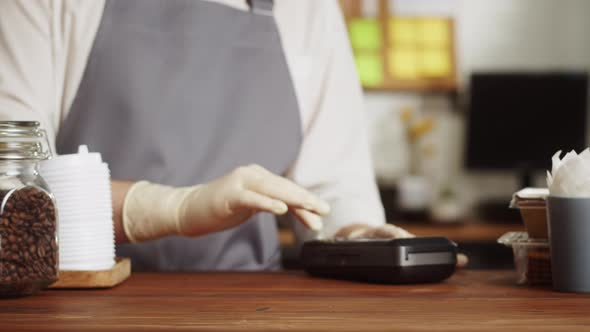 Paying with Credit Bank Card in Cafe