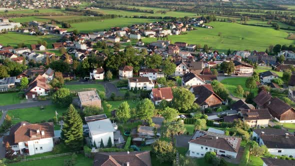 Aerial View of Liechtenstein with Houses on Green Fields in Alps Mountain Valley