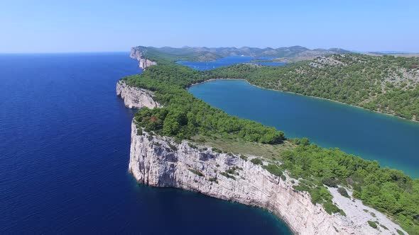 Panoramic view of cliffs on Dalmatian coast and a beautiful salty lake