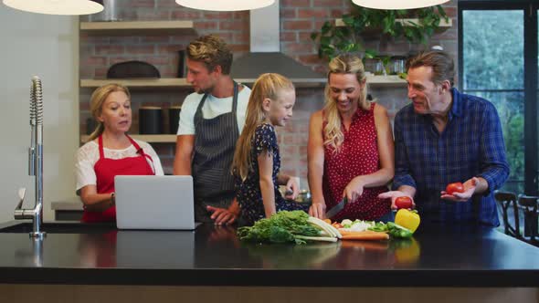 Happy family cooking together at home