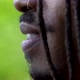 Young Man With African Locks Smiling Then Looking Serious Close Up Face Profile - VideoHive Item for Sale