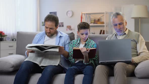 Dad and Son Reading Book and Newspaper, Aging Man Holding Laptop, Generations