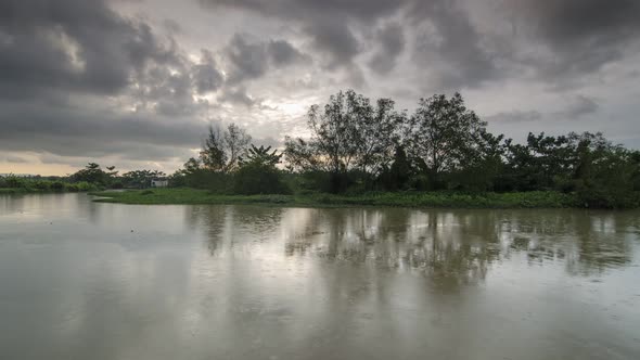 Raining day at Sungai Perai river during sunset.