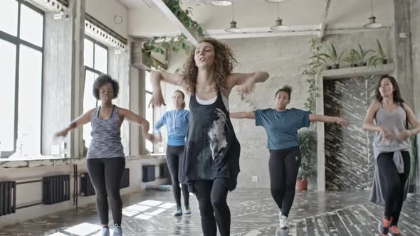 Dance Instructor Teaching Young Women