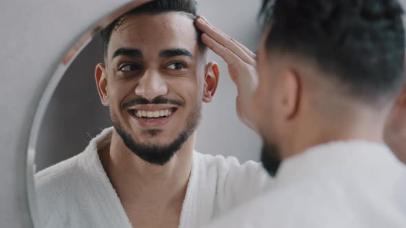 Mirror Reflection Headshot Indian Arabian Bearded Male Macho Bearded Guy Touching Hair After