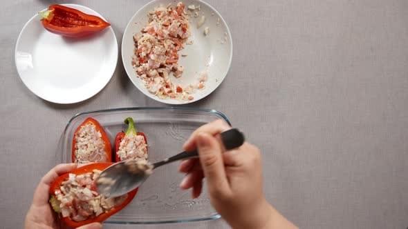 Woman Stuffing Bell Pepper