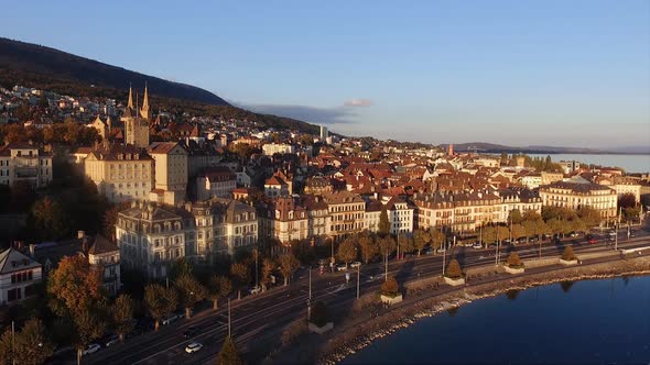 Aerial view of the city of Neuchâtel in Switzerland, sunset on a fall day, castle of Neuchâtel