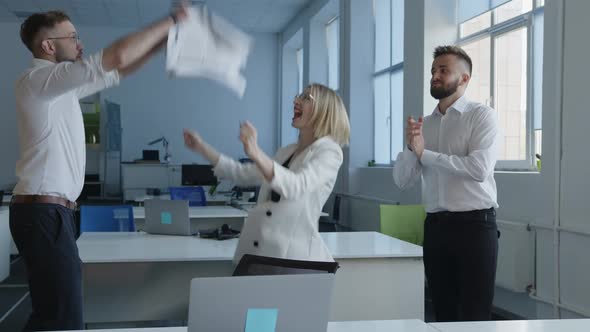 Happy Partners Start Dancing in an Office Company