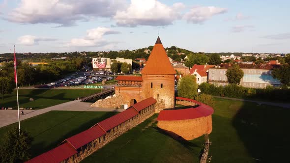 Aerial footage of Kaunas castle, situated in Kaunas old town, Lithuania in beautiful sunny evening.