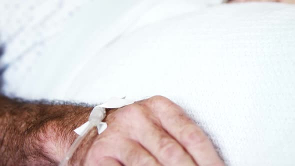 Senior man relaxing in the ward