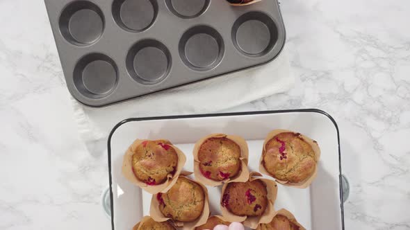 Flat lay. Step by step. Cooling freshly baked cranberry muffins.