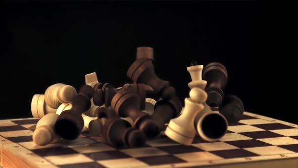 Super Slow Motion Chess Pieces Fall on the Chessboard