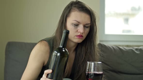 Crying Woman Drinking Alcohol Alone