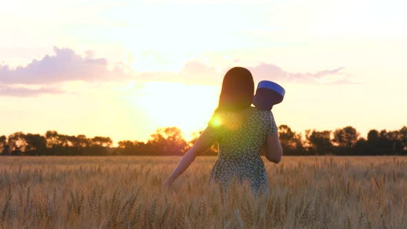 A Happy Woman Enjoys Nature During Sunset