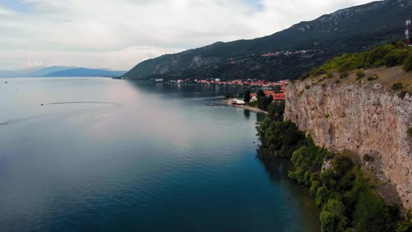 Aerial shot of Macedonia coast. Clif and beautiful water around Pesztani at Ohrid Lake in Southern E