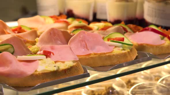 Closeup on Open-face Sandwiches on Display on a Counter in a Store