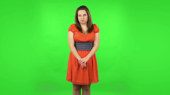Cute Girl Is Waiting and Yawning with Boredom. Green Screen
