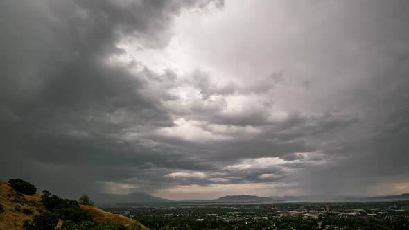 Rain storm over Provo City looking over the valley in timelapse