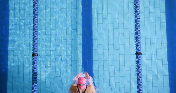 Swimmer training in a swimming pool