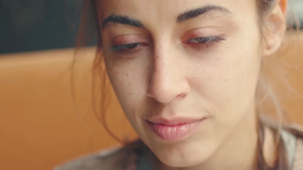 Closeup Face of Thoughtful Concerned Latin Woman Looking at Laptop Screen